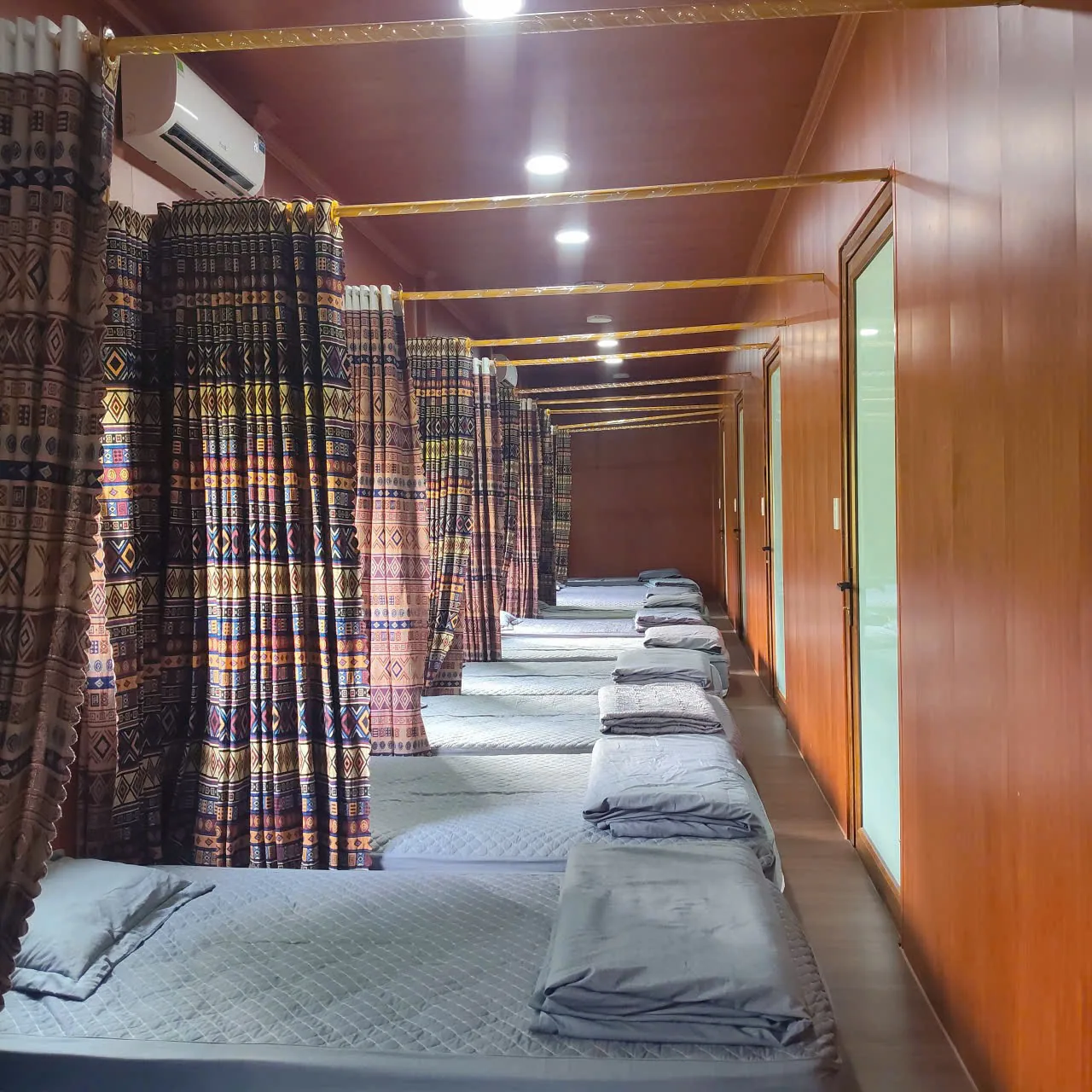 Curtained dorm beds in our hostel
